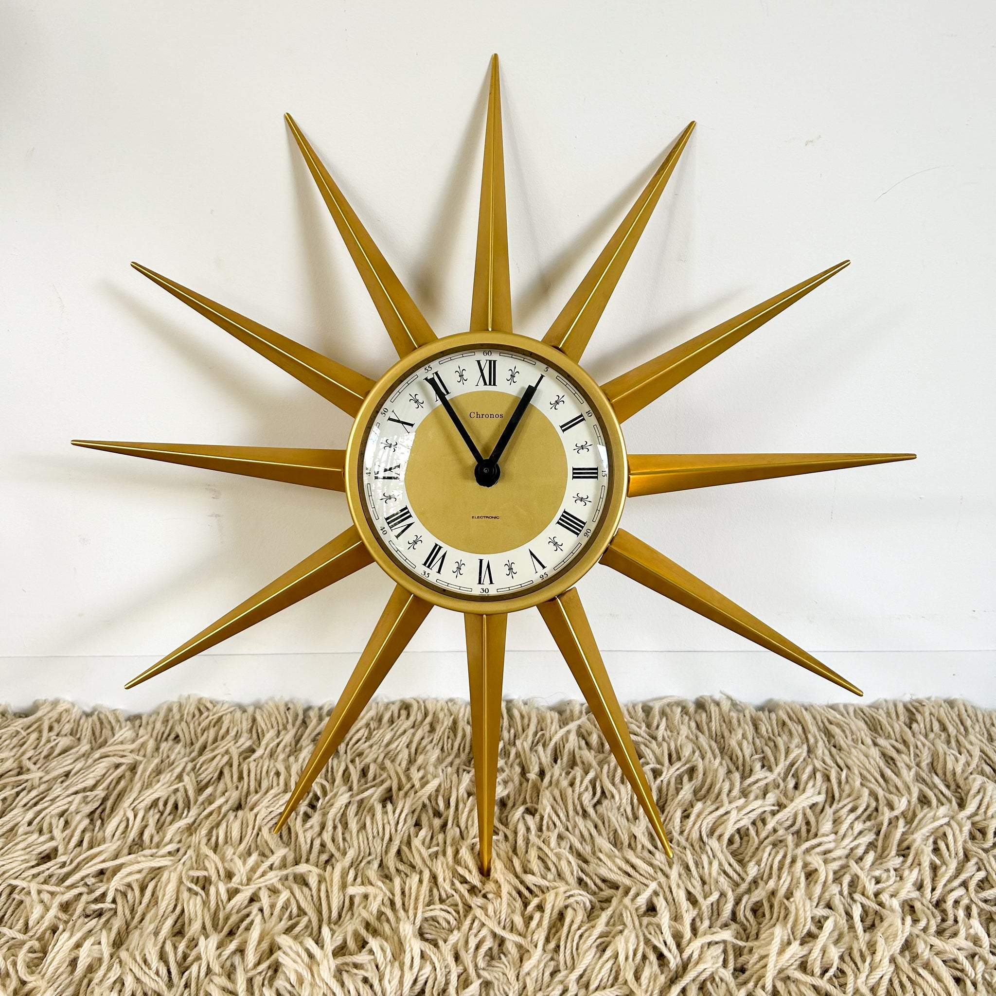 MID CENTURY STARBURST CLOCK