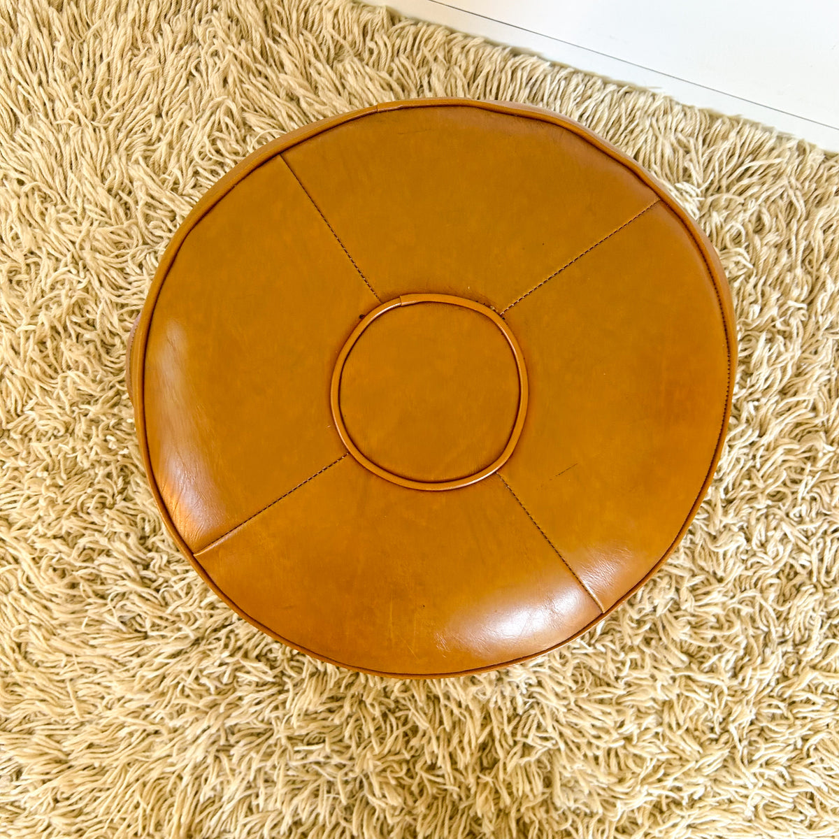 ORANGEY BROWN VINYL FOOTSTOOL