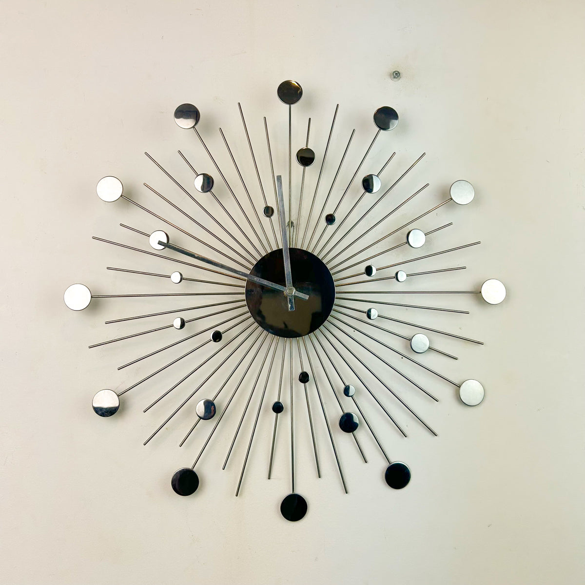 CHROME STARBURST CLOCK - HEY JUDE WORKSHOP • Vintage furniture & objects Melbourne