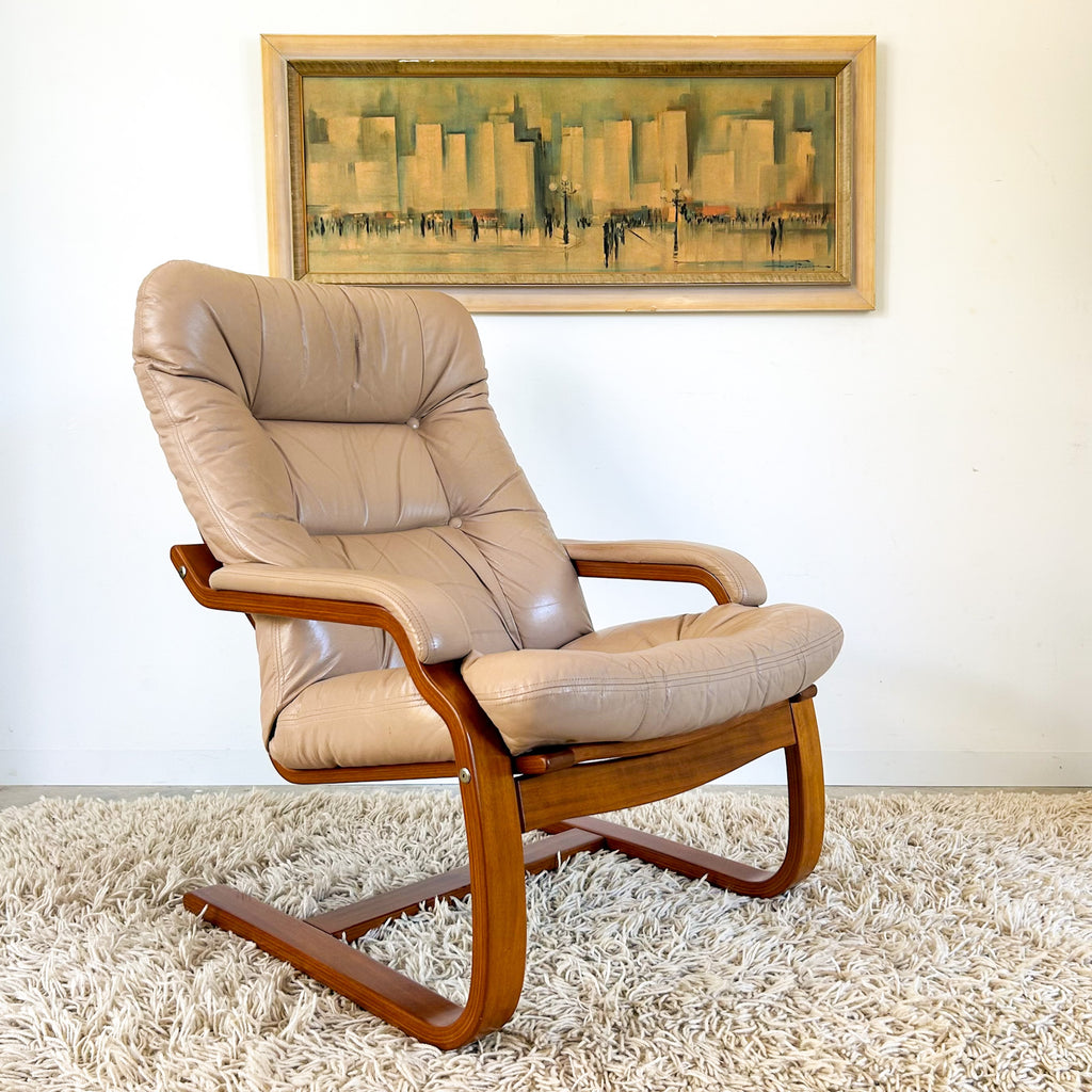 BEIGE LEATHER CANTILEVER ARMCHAIR #1