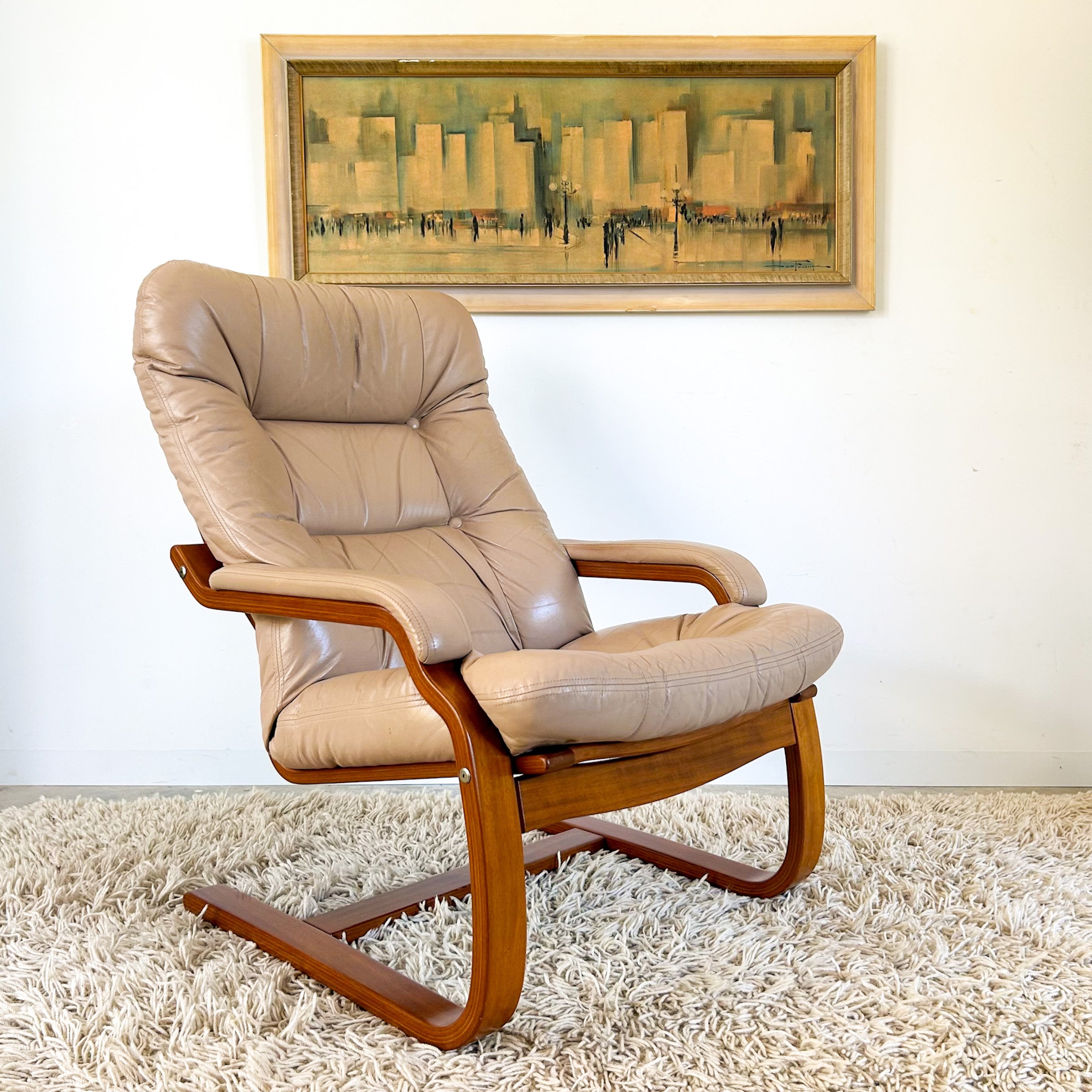 BEIGE LEATHER CANTILEVER ARMCHAIR #1