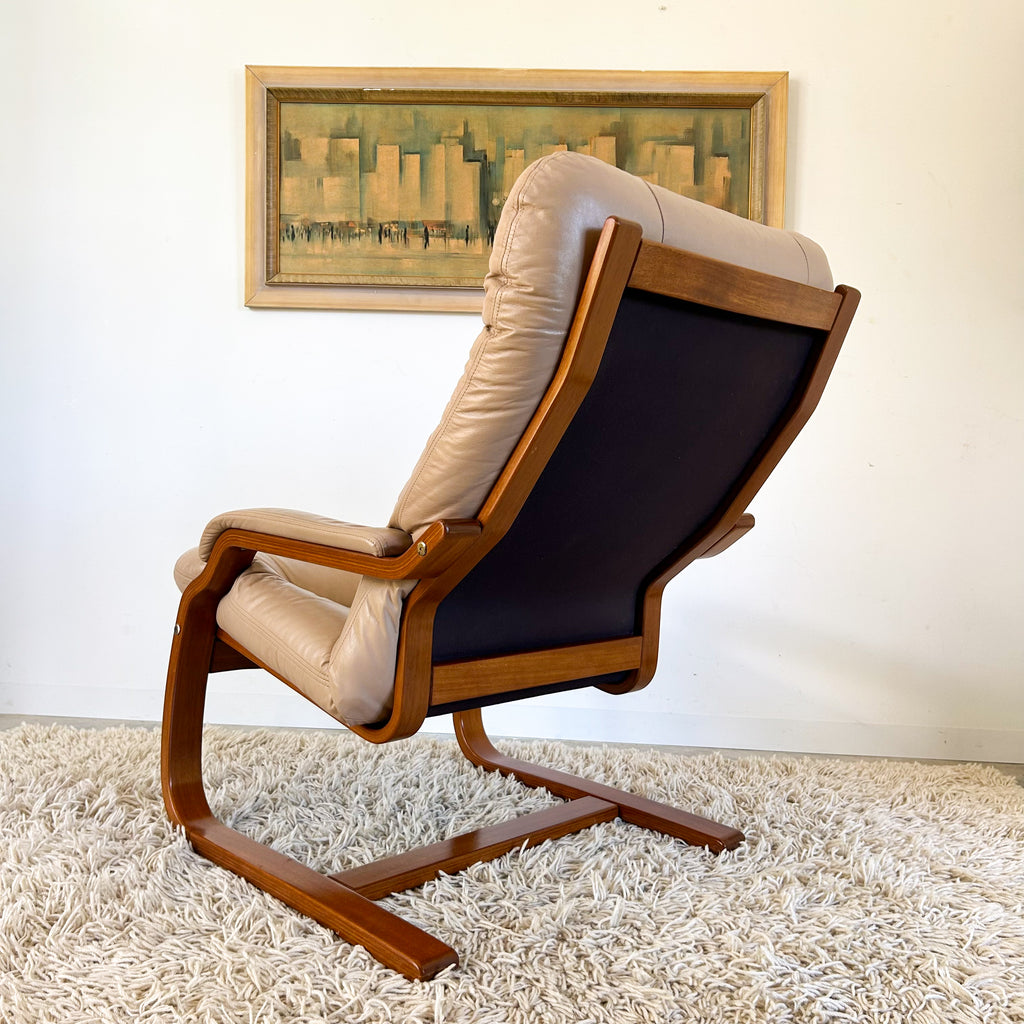 BEIGE LEATHER CANTILEVER ARMCHAIR #1