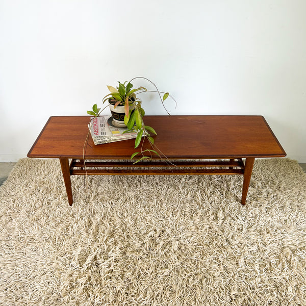 NOBLETT COFFEE TABLE WITH SLATTED MAGAZINE RACK