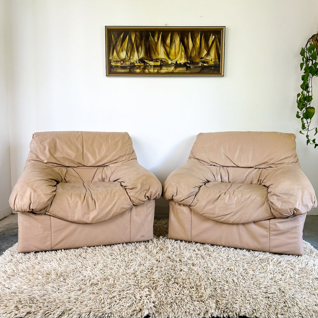 PEACHY PINK LEATHER ARMCHAIRS
