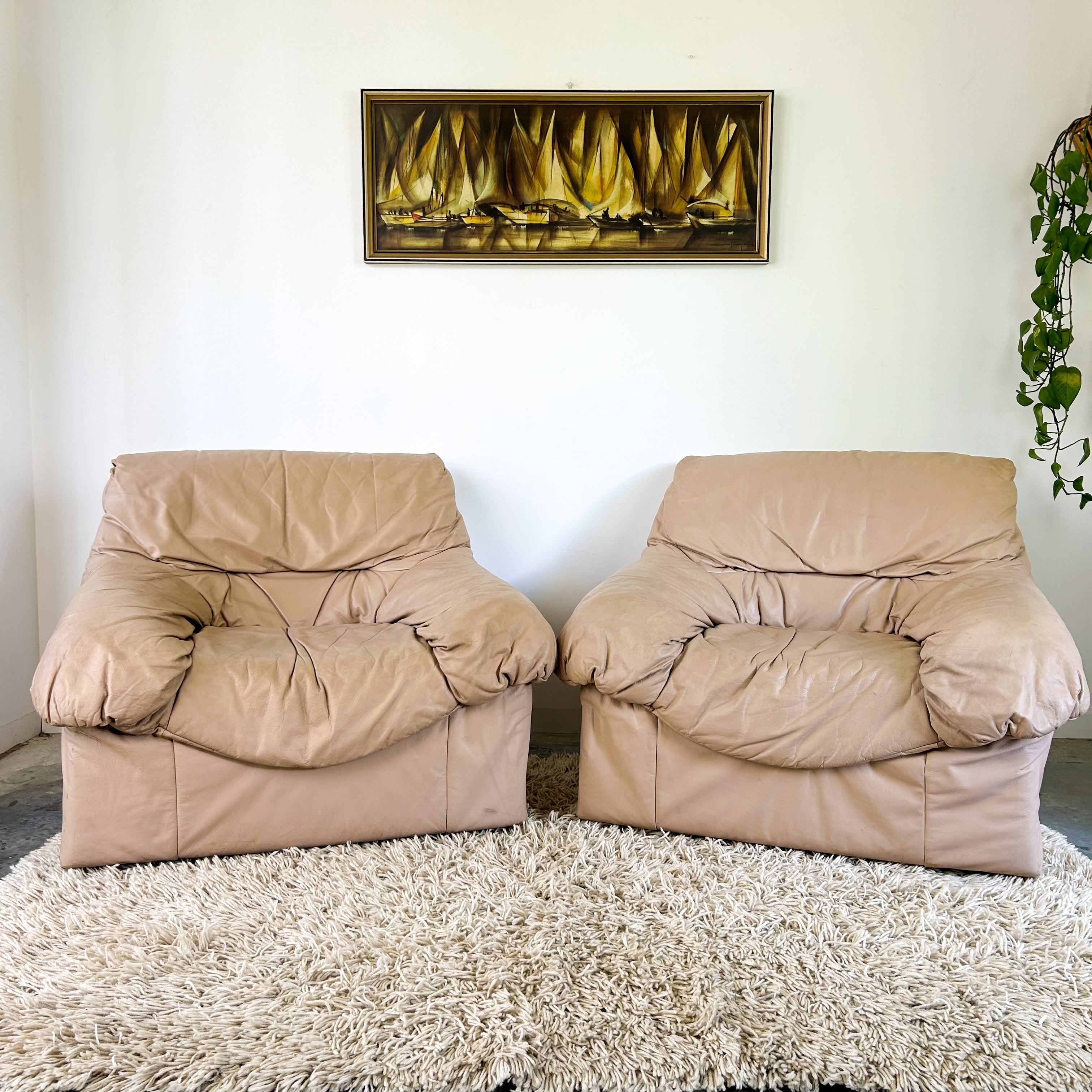 PEACHY PINK LEATHER ARMCHAIRS