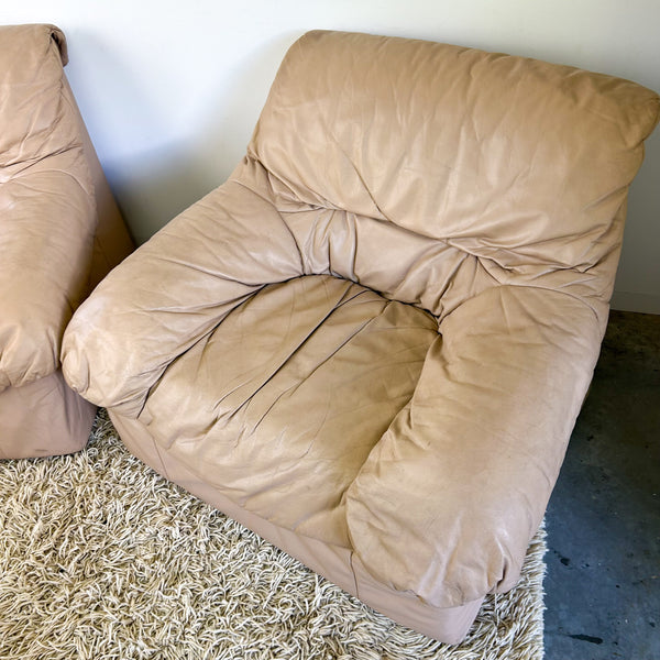PEACHY PINK LEATHER ARMCHAIRS