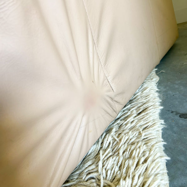 PEACHY PINK LEATHER ARMCHAIRS