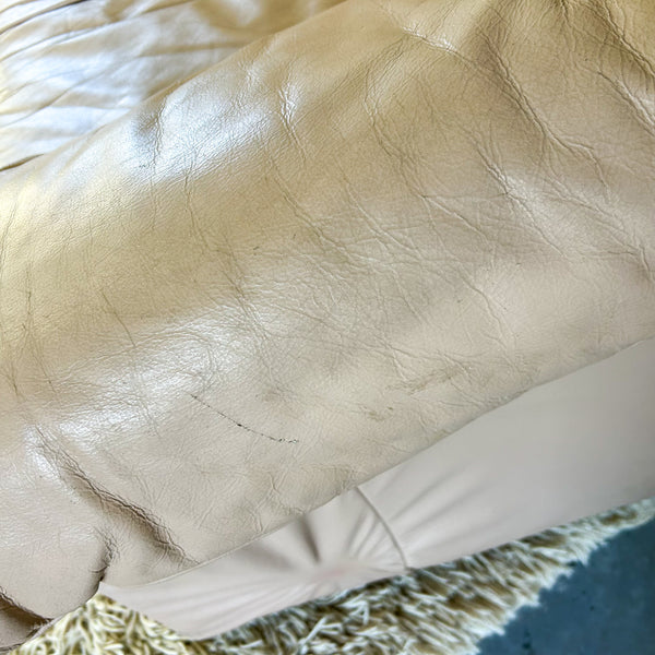 PEACHY PINK LEATHER ARMCHAIRS