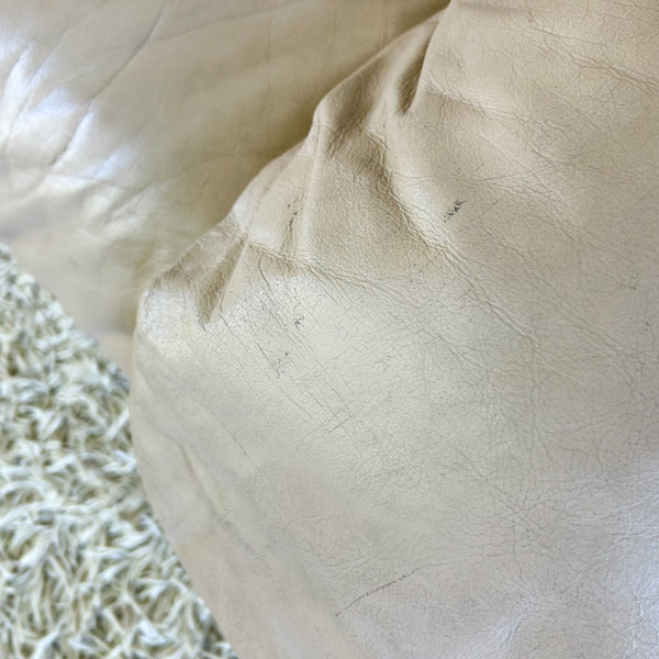 PEACHY PINK LEATHER ARMCHAIRS