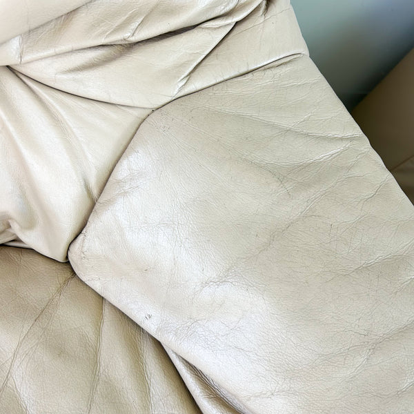 PEACHY PINK LEATHER ARMCHAIRS