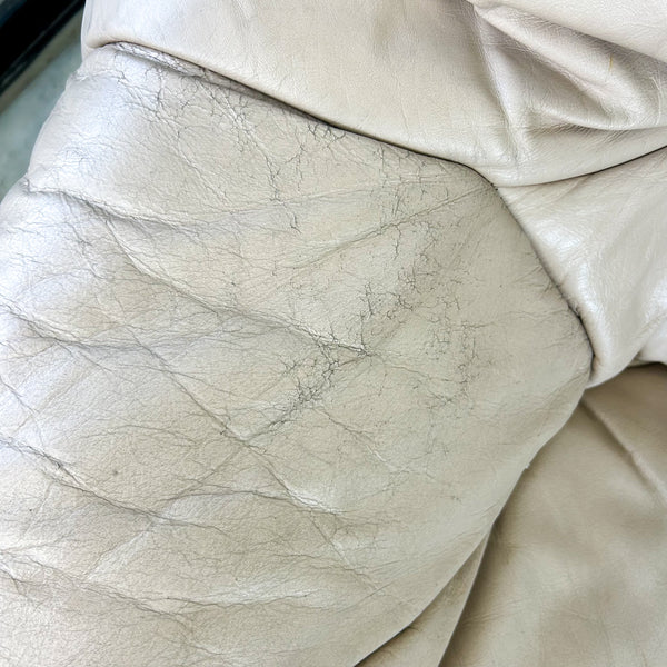 PEACHY PINK LEATHER ARMCHAIRS