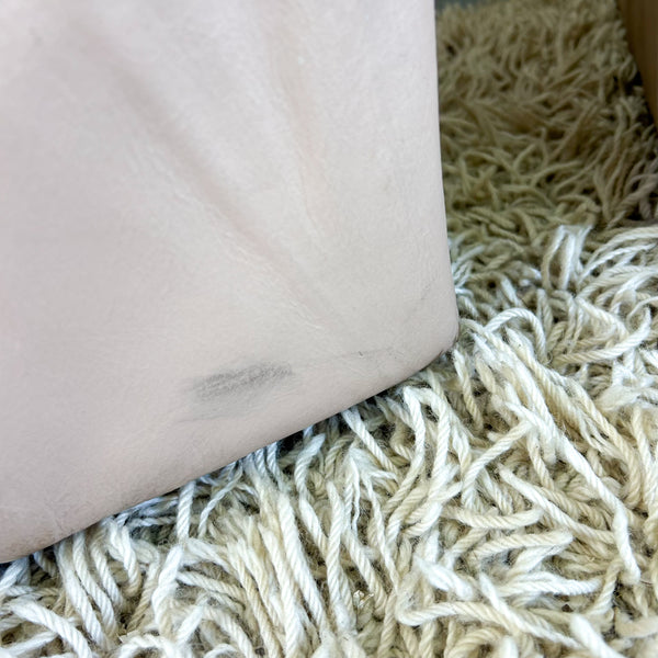 PEACHY PINK LEATHER ARMCHAIRS