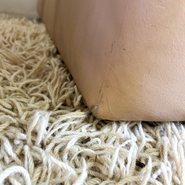 PEACHY PINK LEATHER ARMCHAIRS