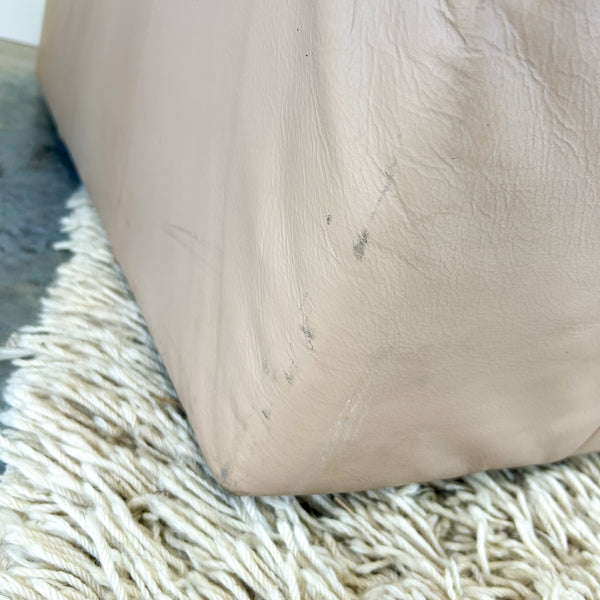 PEACHY PINK LEATHER ARMCHAIRS