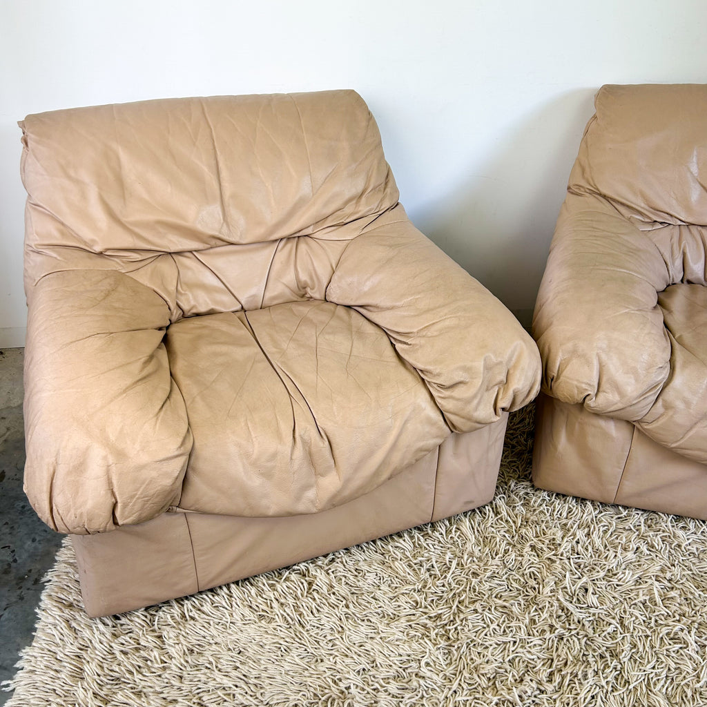 PEACHY PINK LEATHER ARMCHAIRS