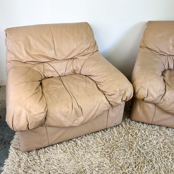 PEACHY PINK LEATHER ARMCHAIRS