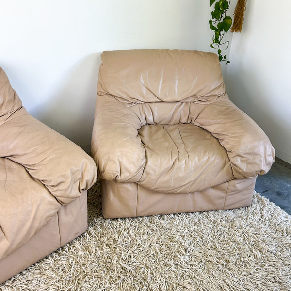 PEACHY PINK LEATHER ARMCHAIRS