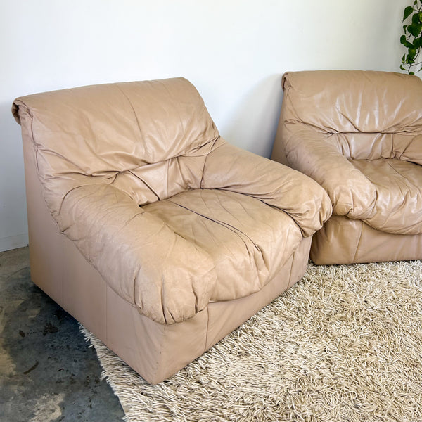 PEACHY PINK LEATHER ARMCHAIRS