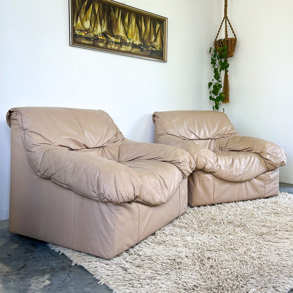 PEACHY PINK LEATHER ARMCHAIRS
