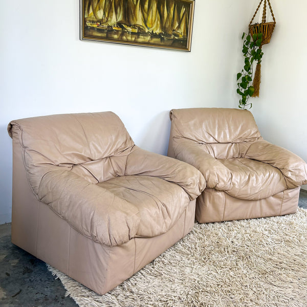 PEACHY PINK LEATHER ARMCHAIRS