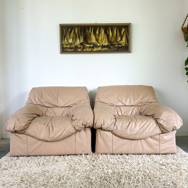 PEACHY PINK LEATHER ARMCHAIRS