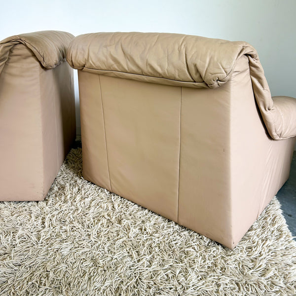 PEACHY PINK LEATHER ARMCHAIRS