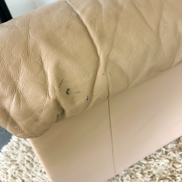 PEACHY PINK LEATHER ARMCHAIRS