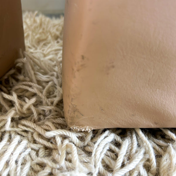 PEACHY PINK LEATHER ARMCHAIRS