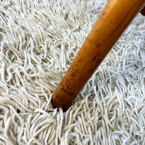 MID CENTURY GREEN VINYL ARMCHAIRS