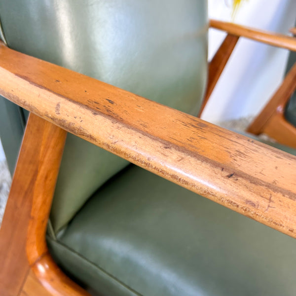 MID CENTURY GREEN VINYL ARMCHAIRS