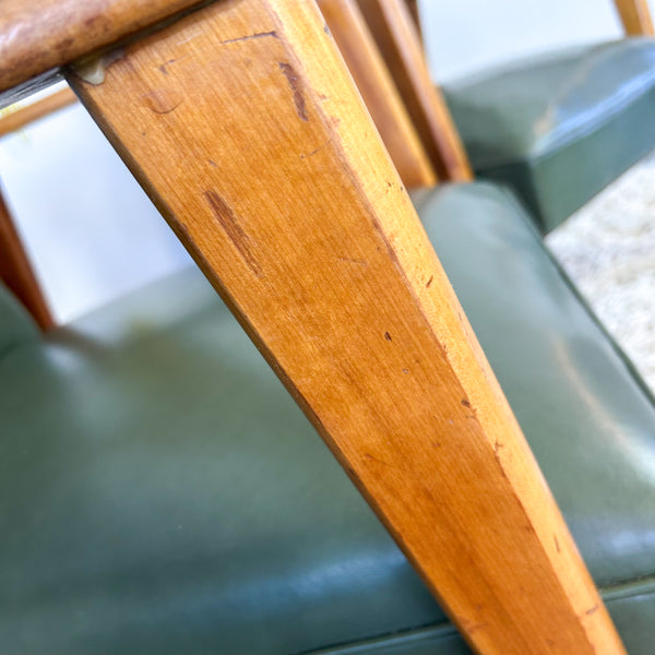 MID CENTURY GREEN VINYL ARMCHAIRS