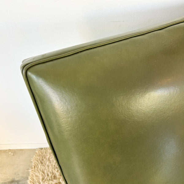 MID CENTURY GREEN VINYL ARMCHAIRS