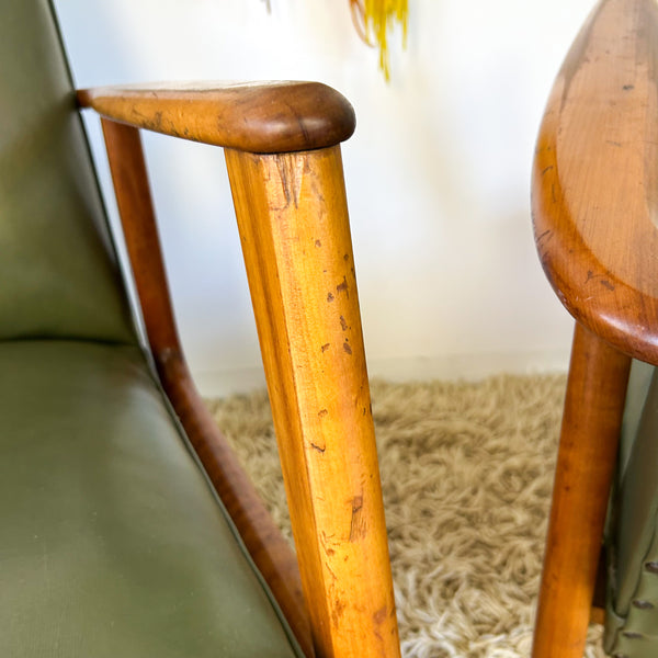 MID CENTURY GREEN VINYL ARMCHAIRS