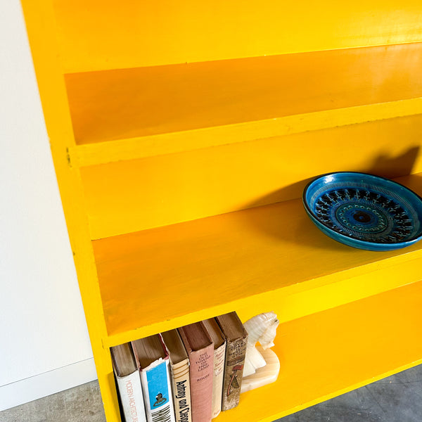 YELLOW WOODEN BOOKCASE
