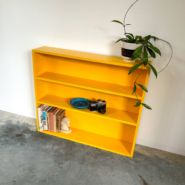 YELLOW WOODEN BOOKCASE